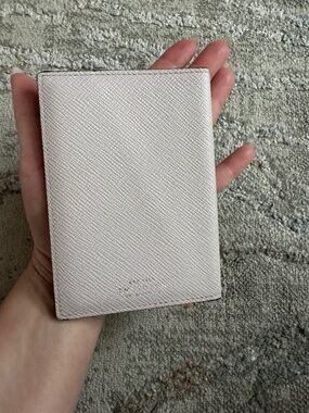 Smythson leather passport cover in pale pink